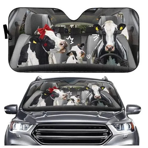 Telescopic aluminium foil car sun shield expanded on a dashboard