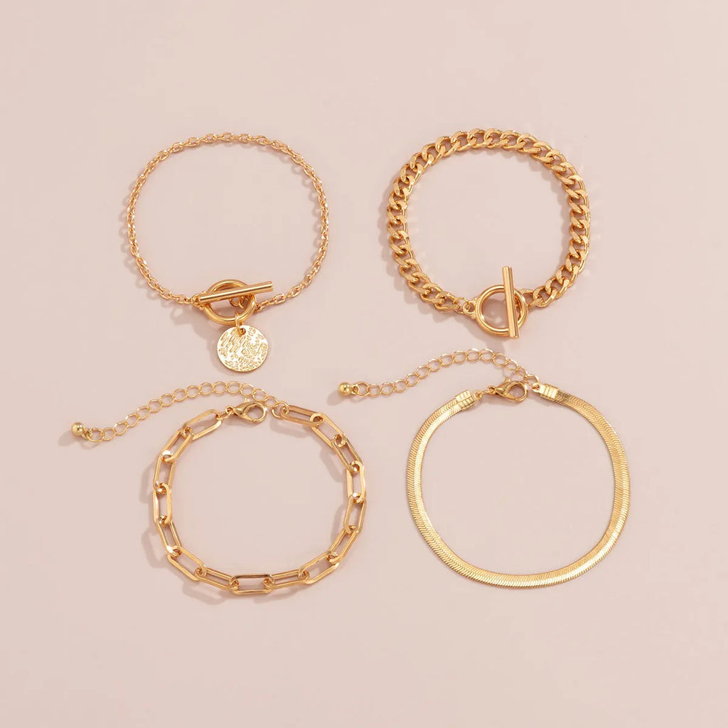 Set of 4 metal chain bracelets in gold or silver with snake bone and hollow chain designs