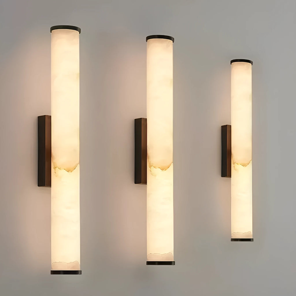 Marble wall lamp with warm light, black finish, 50cm long, mounted on a living room wall