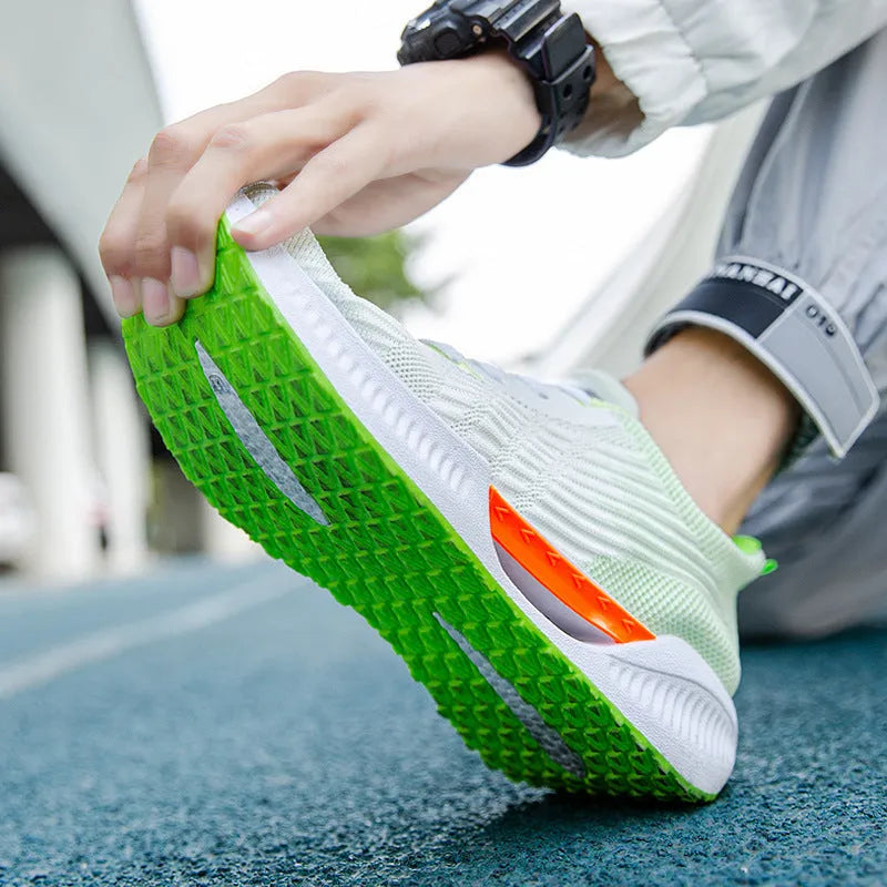Men's blue casual sports mesh shoes with round toe and cloth upper on a plain background.