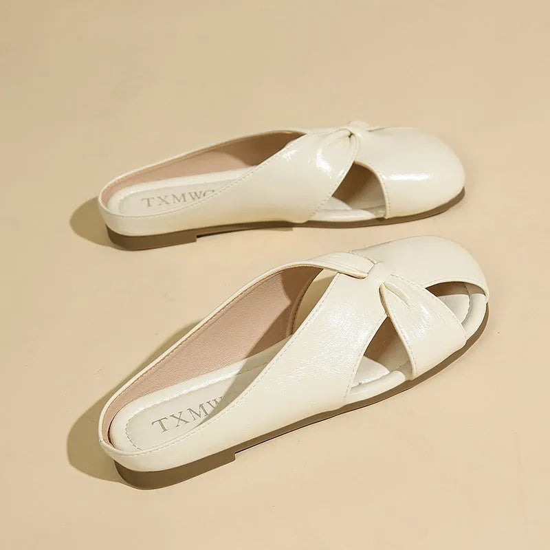 Women's hollow-out half slippers in beige with patent PU leather upper and rubber sole