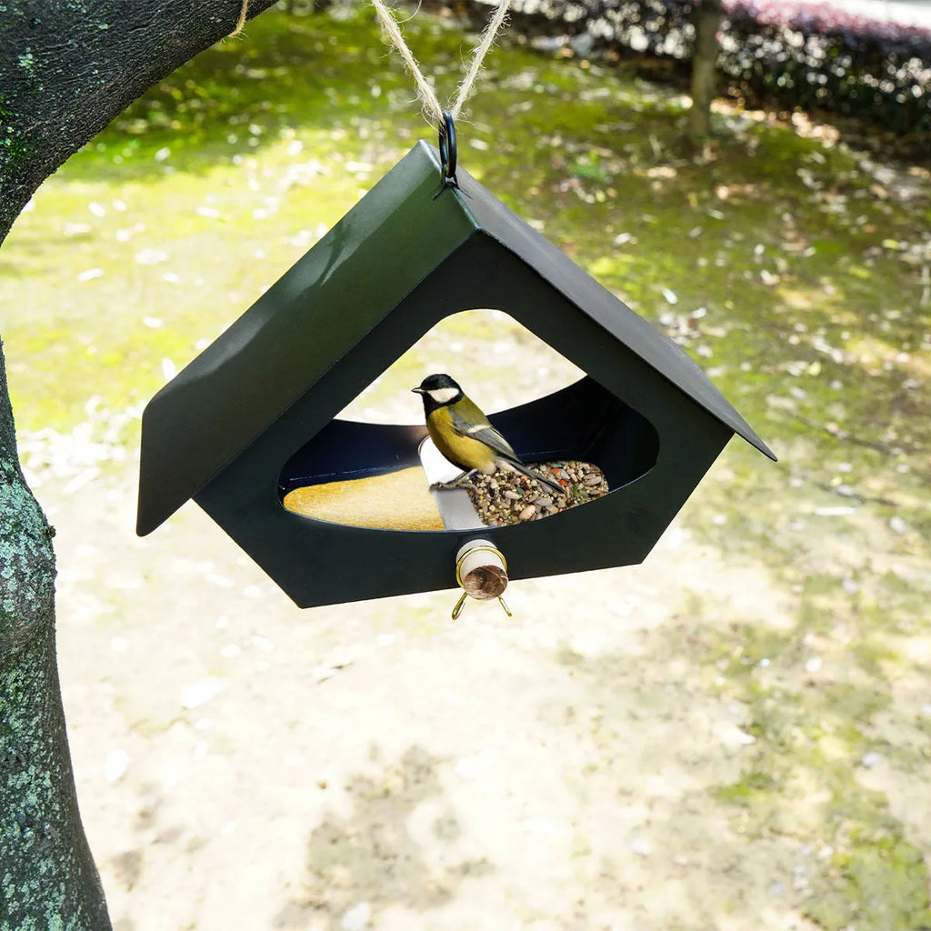 Modern simple iron bird house with anti-rain roof in garden setting
