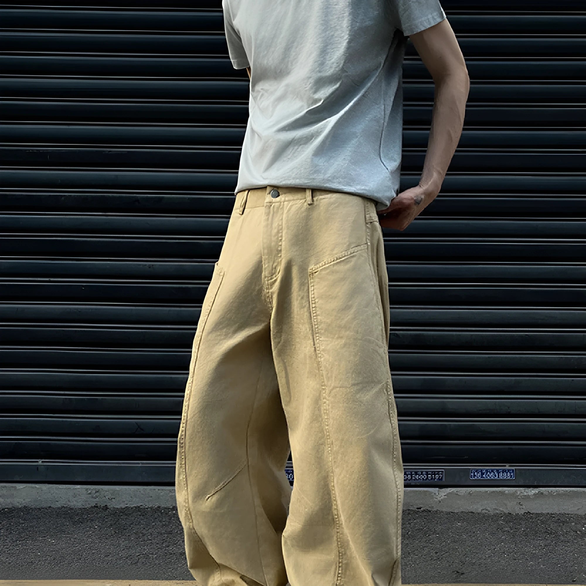 Men's straight-leg cotton trousers in solid khaki colour showing front view
