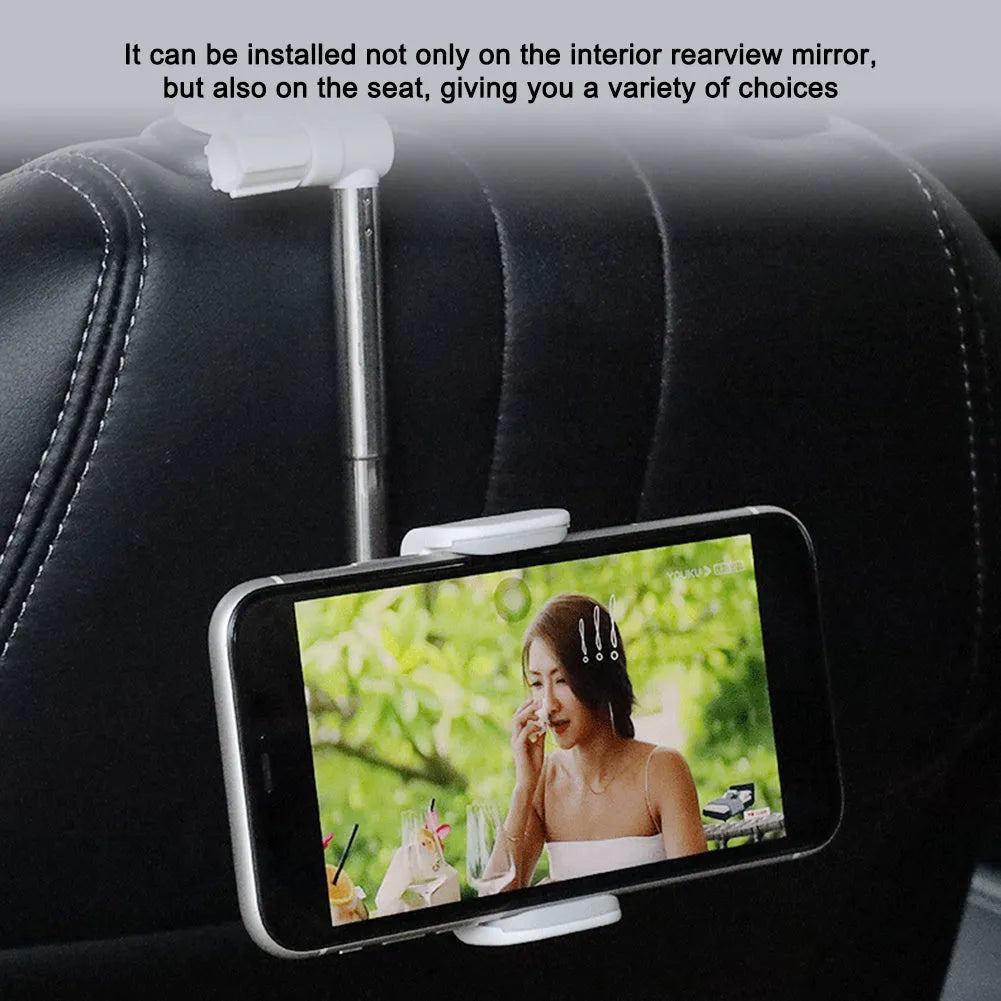 Black ABS car phone holder with 360-degree rotating mechanism mounted on car dashboard