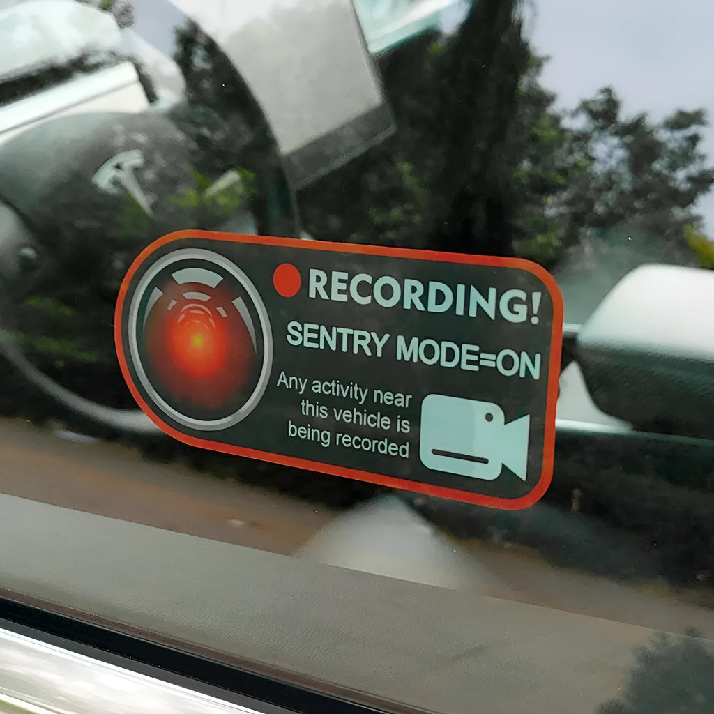 Tesla Sentry Mode electrostatic warning sticker measuring 11x5cm with English security text