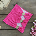 Women's solid colour one-piece swimsuit with high waist and hollow-out tube top, paired with a matching short skirt.