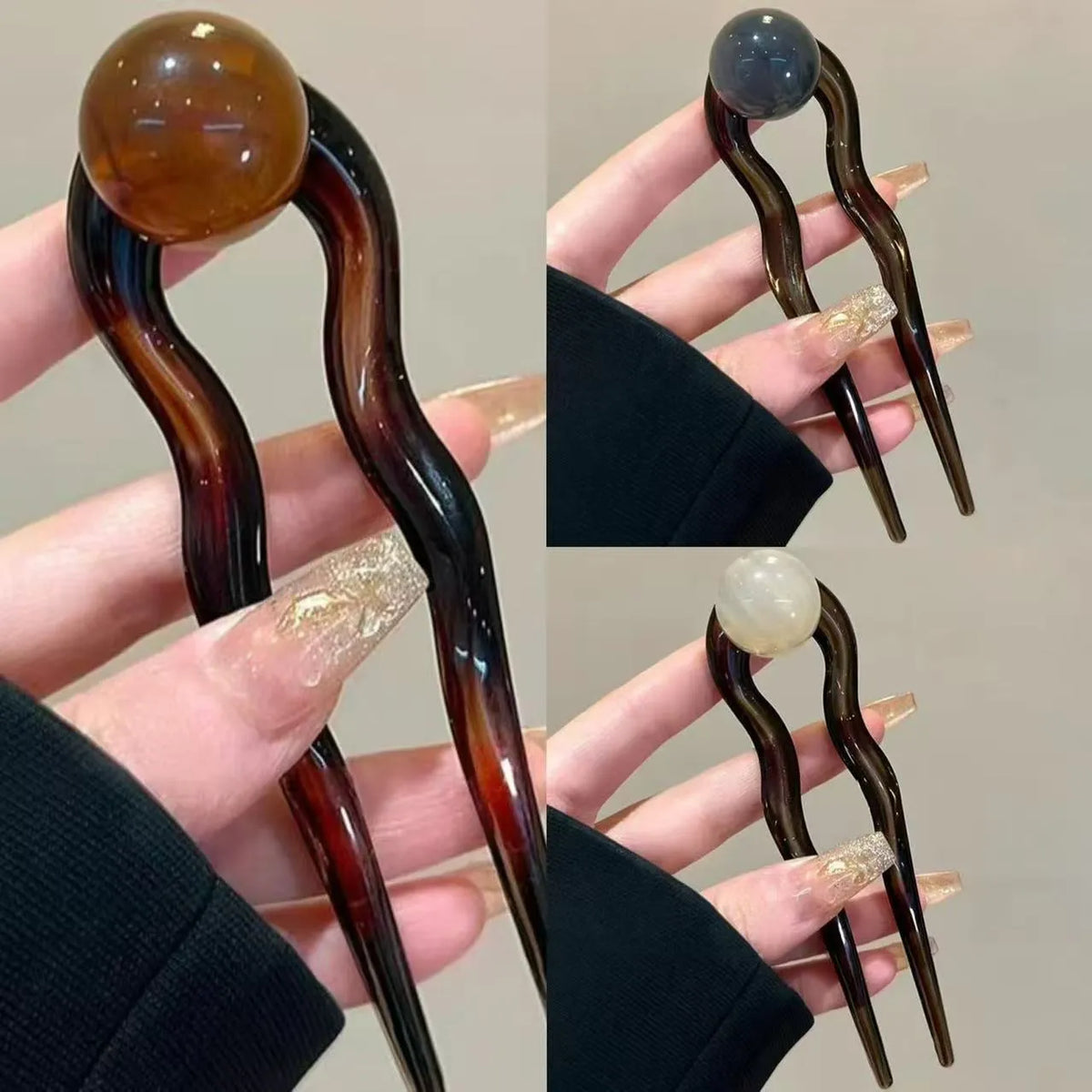 Acrylic U-shaped hair barrette with a small spherical decoration in a beige and caramel two-tone colour combination.