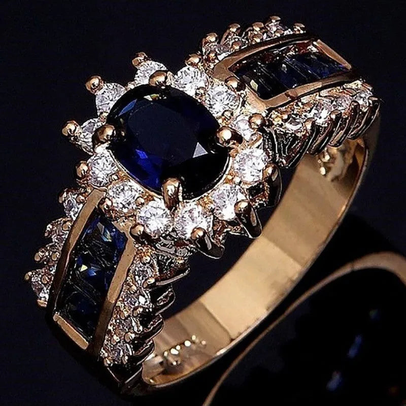 Personalised zinc alloy unisex ring in sunflower blue diamond and square zircon designs on a size chart.