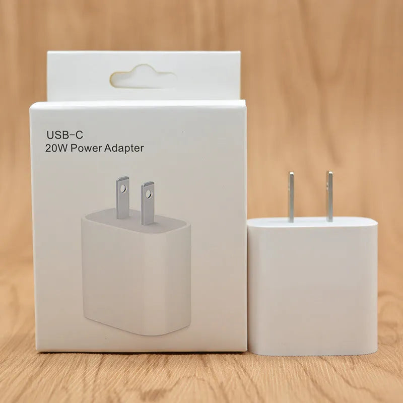 White 20W USB-C PD wall charger with UK three-pin plug.