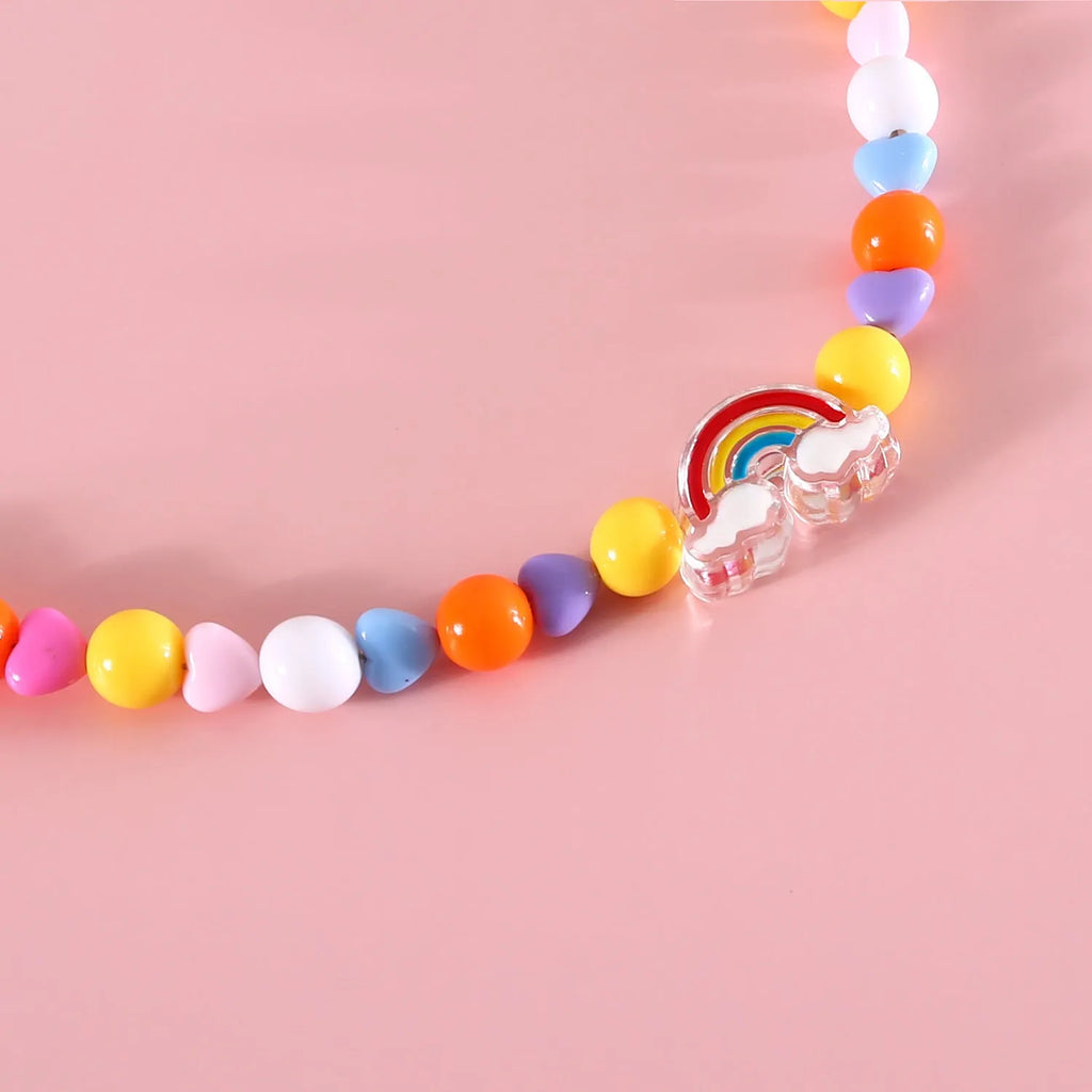 Colourful plastic bead necklace for small pets with peach, rainbow, or small flower pattern options.