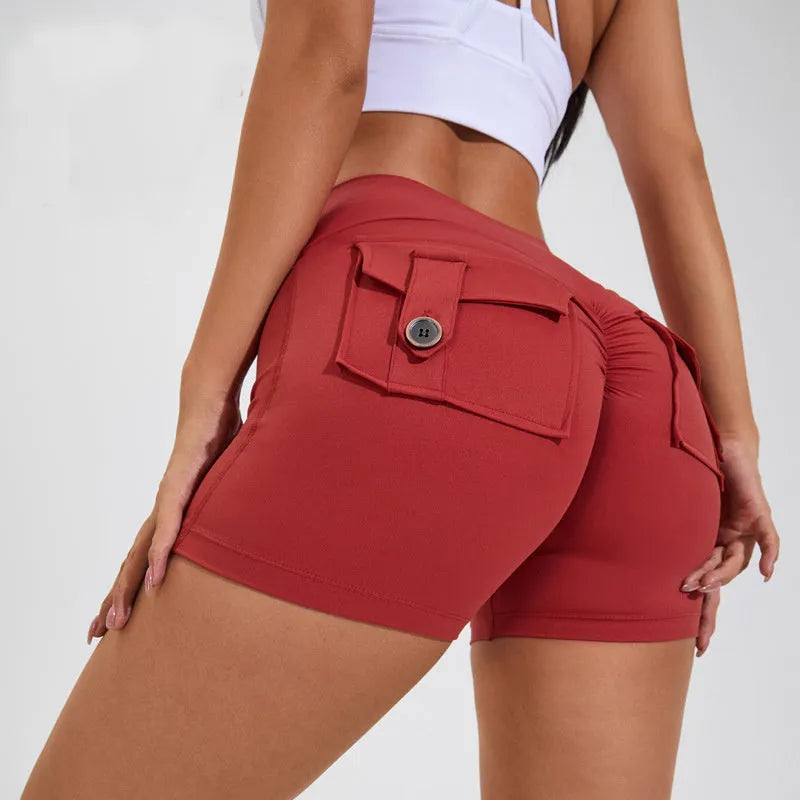 Women's high waist fitness shorts with side pockets in quick-dry nylon fabric