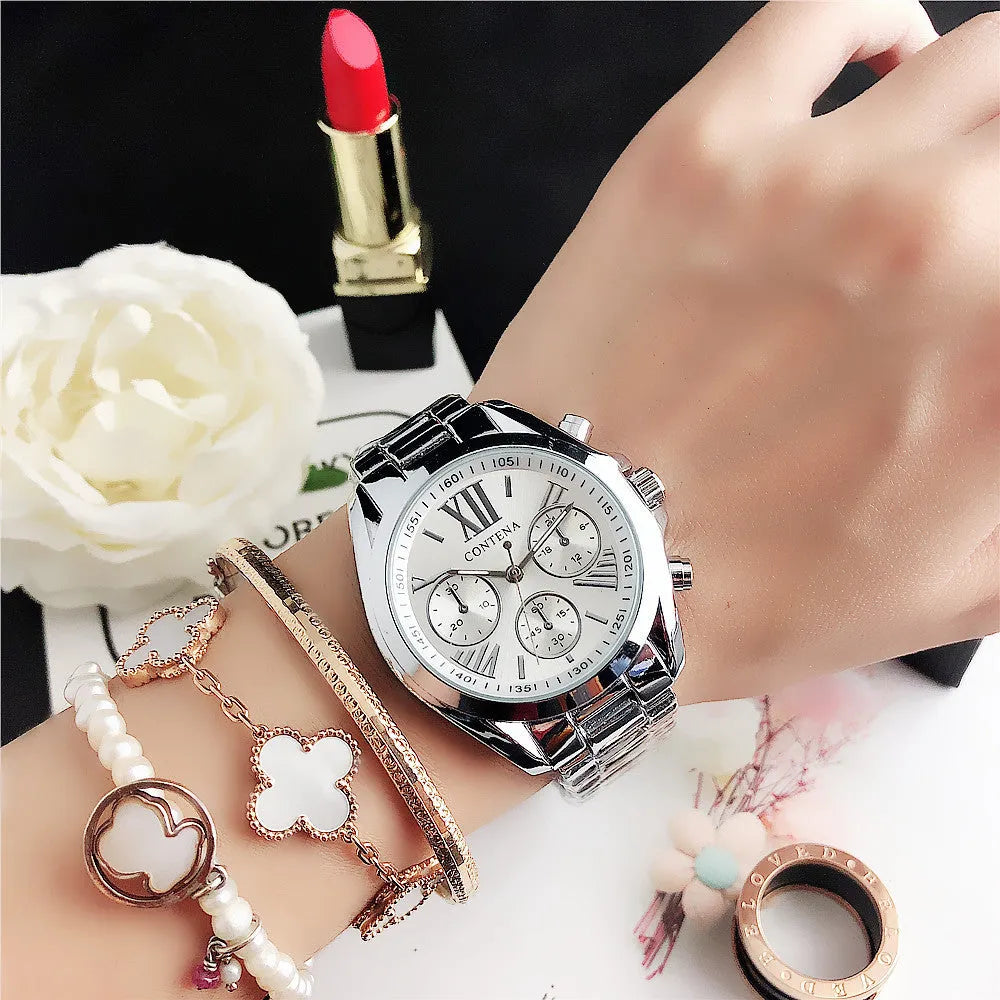 Women's silver and rose gold mesh strap watch with diamond quartz movement and pointer display