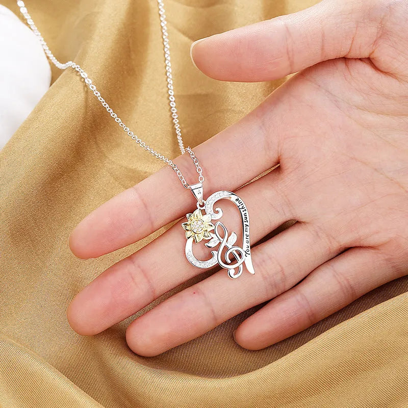 Two-colour copper sunflower pendant on heart-shaped clavicle chain, pastoral style, flower shape