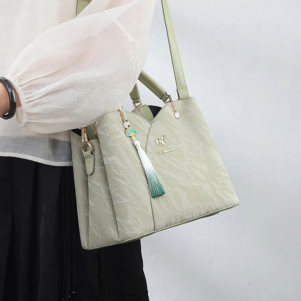 Women's soft PU messenger bag in horizontal square design with sewing thread detail