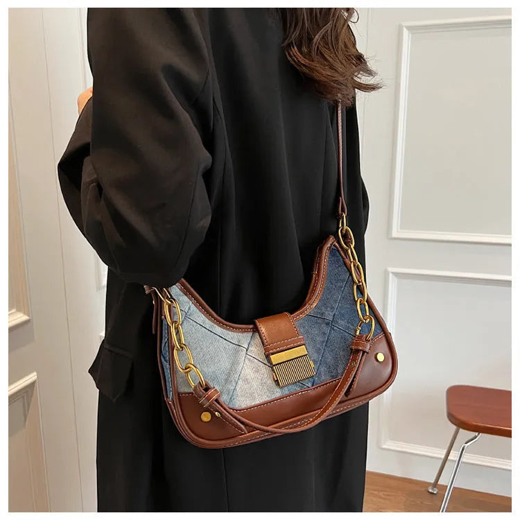 Brown denim women's bucket shoulder bag with chain straps and diamond mesh detailing
