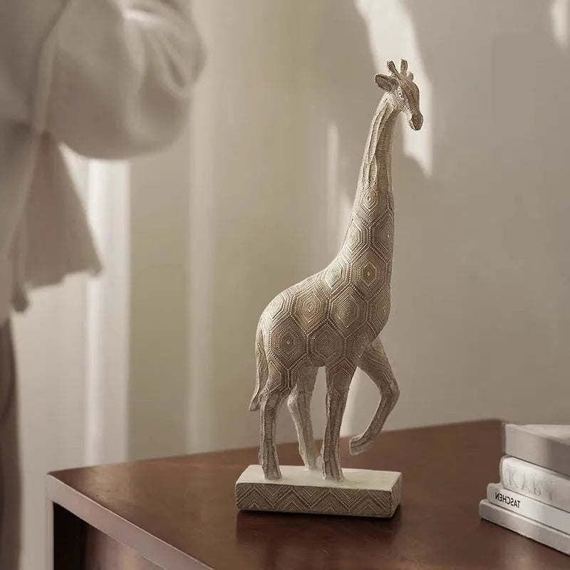 Wood colour European style resin giraffe ornament measuring 30.5 cm tall.