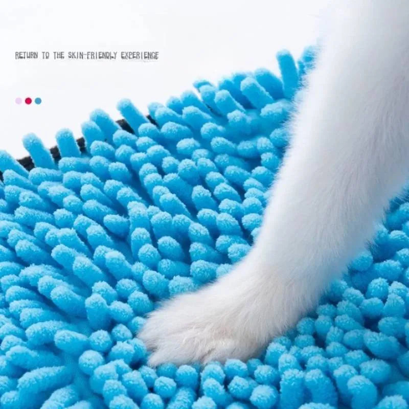 Blue quick-dry pet bath towel shown draped, sized 62 cm by 23 cm for drying dogs and cats.
