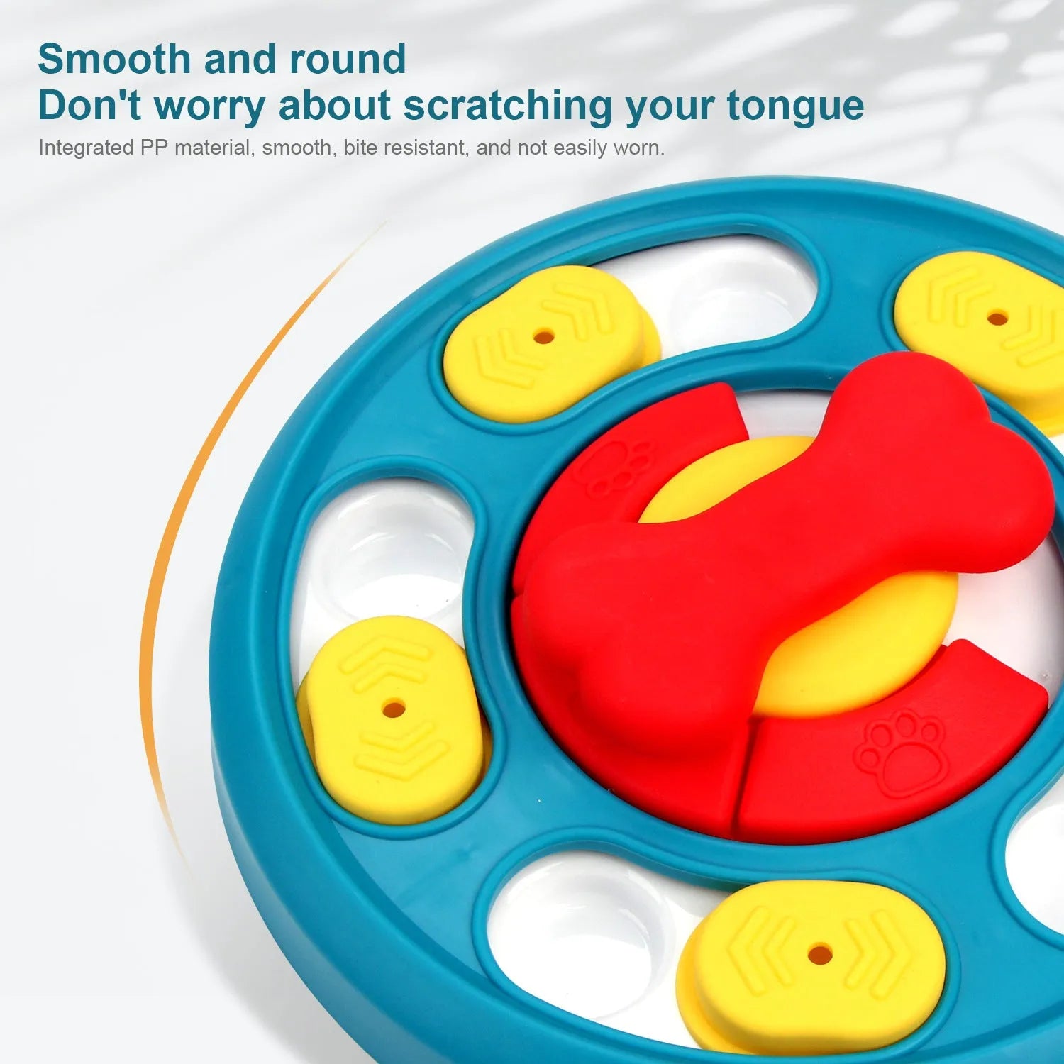 Leak-proof plastic dog feeding puzzle spinner toy in blue on a light background