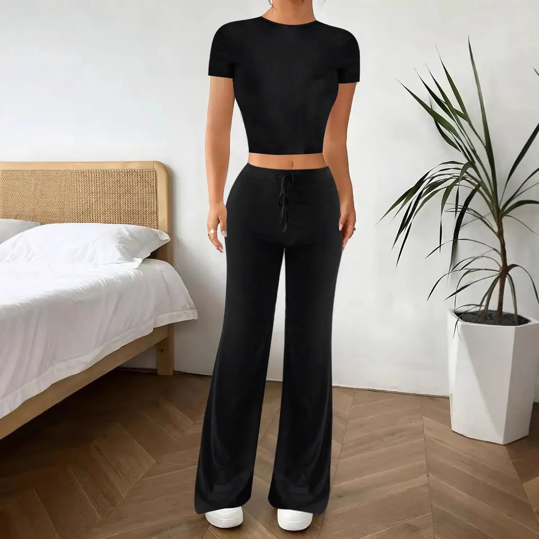 Women's black high waist trousers and short sleeve T-shirt two piece suit on hanger