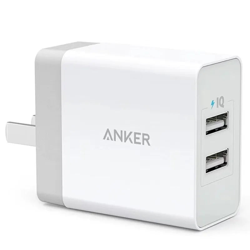 White dual-port 12W USB charger with national standard plug on a plain background