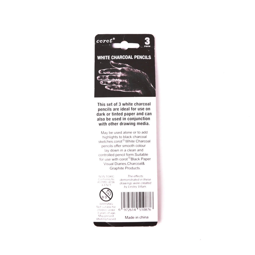 Three white charcoal pencils for sketching on dark paper with highlighting effect