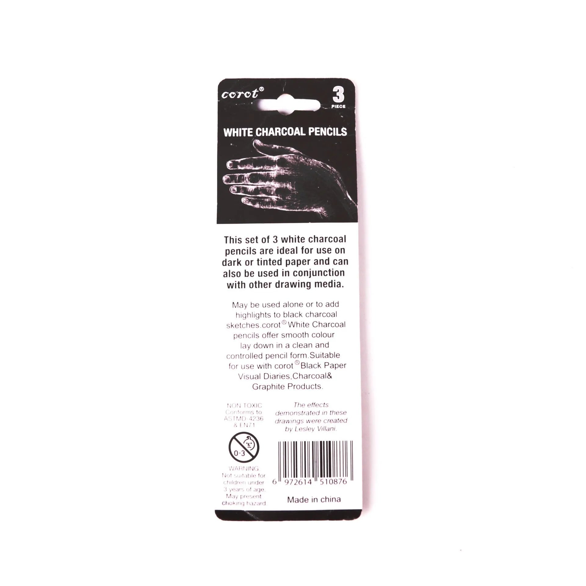 Three white charcoal pencils for sketching on dark paper with highlighting effect