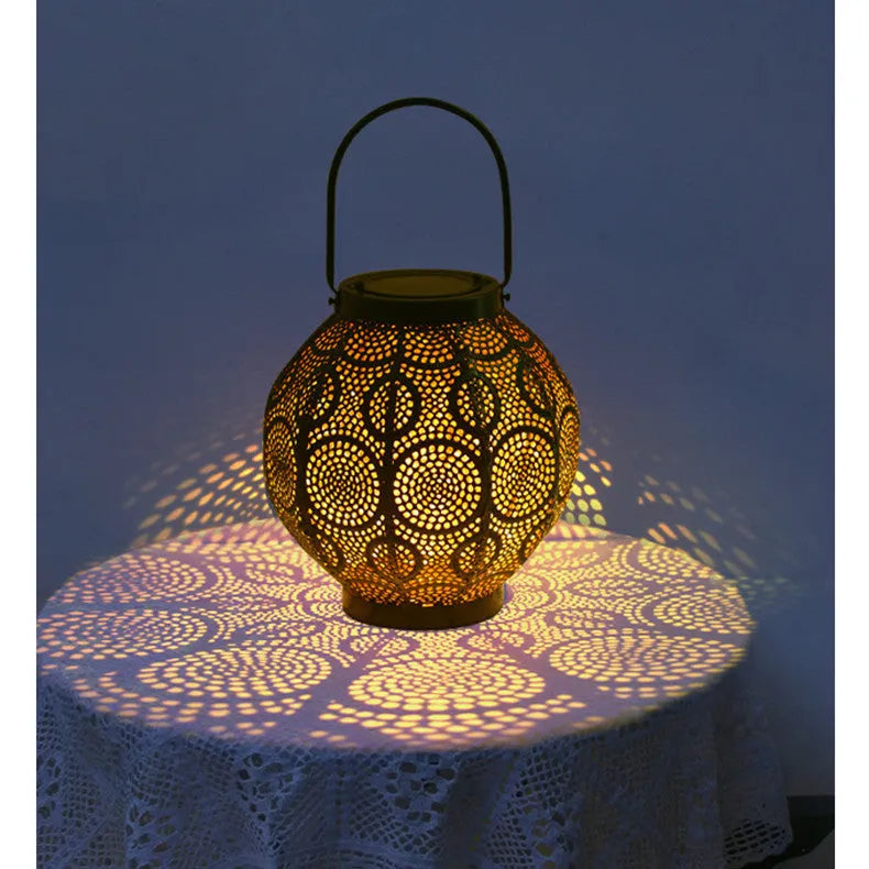 Hollow decorative iron solar lamp for outdoor courtyard use