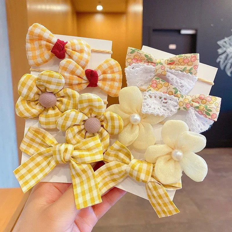 Fabric hair bow set for children with bow flower pattern in multiple colours
