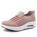 Women's mesh low-top air cushion thick sole breathable shoes in white with rubber soles showing side view