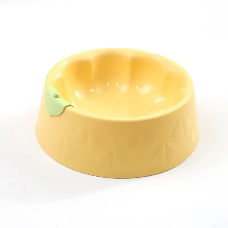 Green plastic double pet bowl for dog and cat food and water on a white background