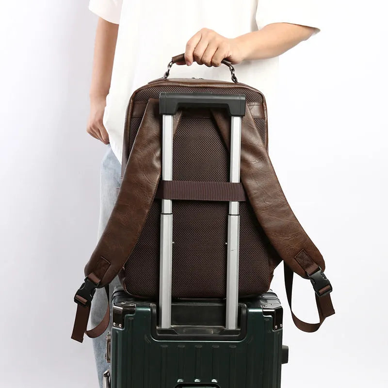 Men's casual business backpack in PU leather, solid colour, black, urban simplicity style, side view