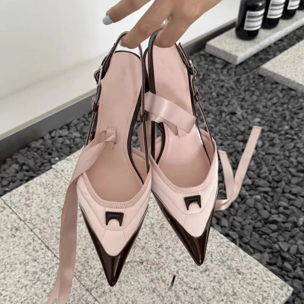 Women's black lace-up high heels with special-shaped root design showing cowhide upper and adjustable ankle fastening