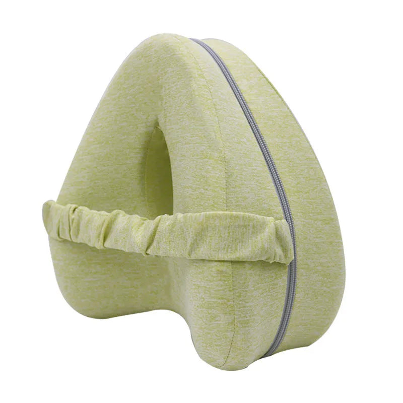 Dark blue jacquard heart-shaped memory foam leg pillow for adults showing its contoured design.