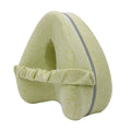 Dark blue jacquard heart-shaped memory foam leg pillow for adults showing its contoured design.