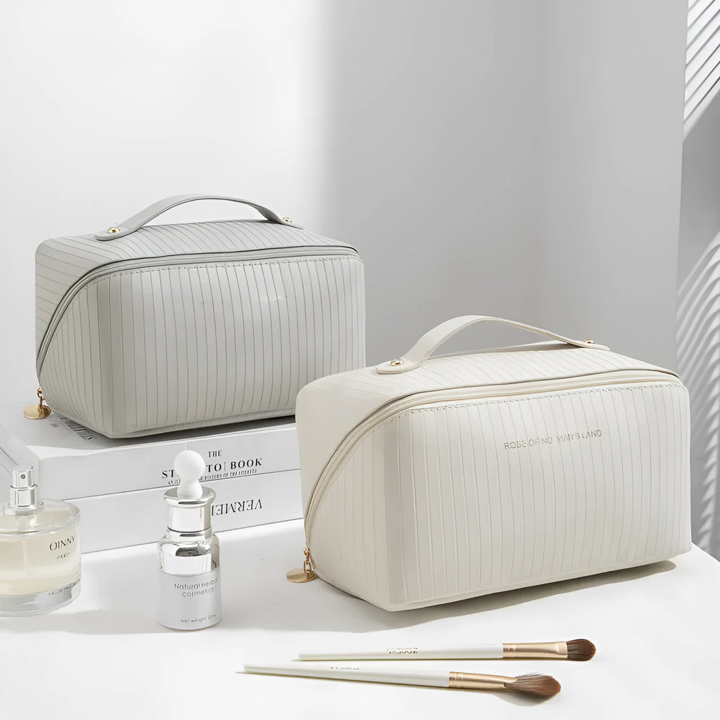 Vertical pattern cubic PU makeup bag in beige, 22.5cm length, for travel cosmetics storage.