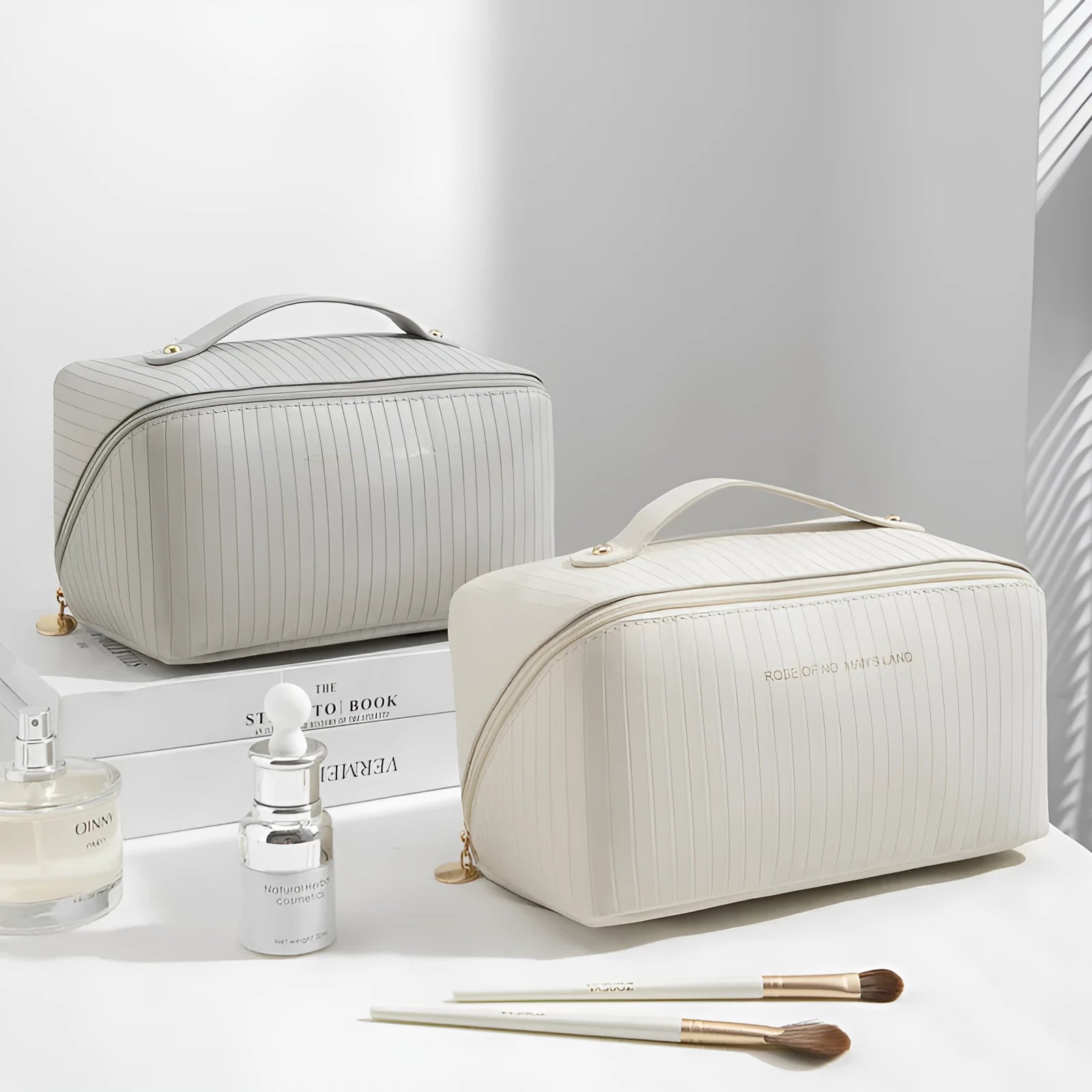 Vertical pattern cubic PU makeup bag in beige, 22.5cm length, for travel cosmetics storage.