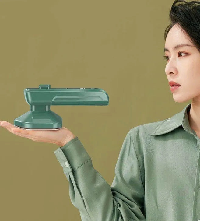 Dark green portable hanging steam iron with ceramic panel and handheld design