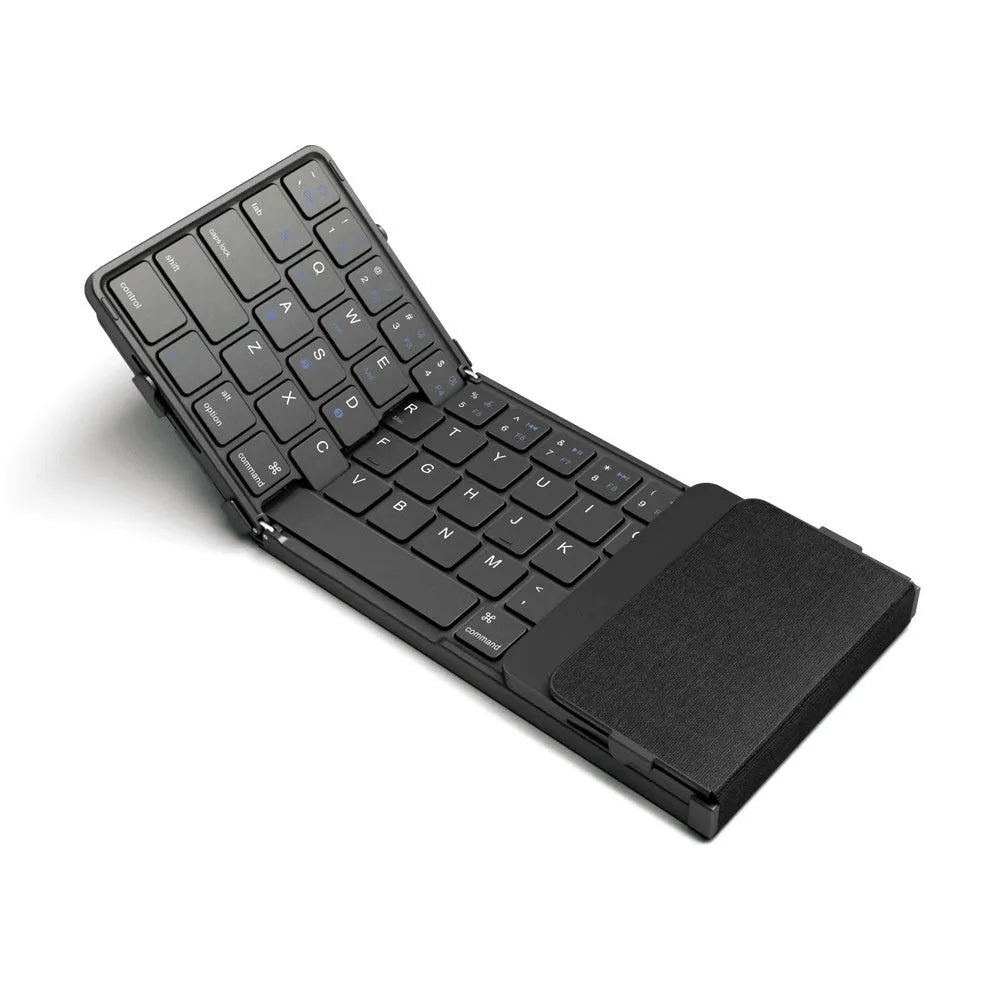 Black folding Bluetooth keyboard for mobile phones and tablets showing compact folded design