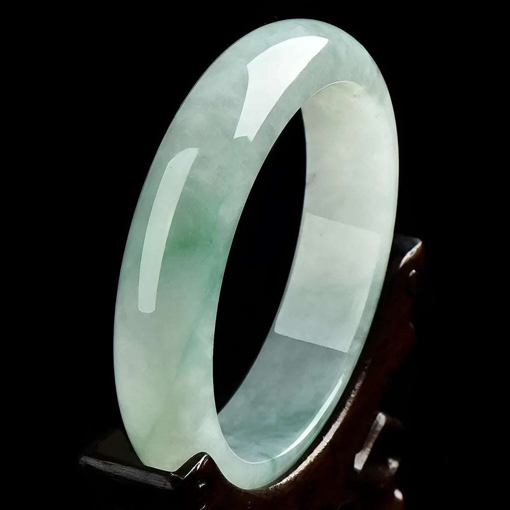 Light green jade bead bracelet showing natural stone texture with sizing options from 53mm to 64mm