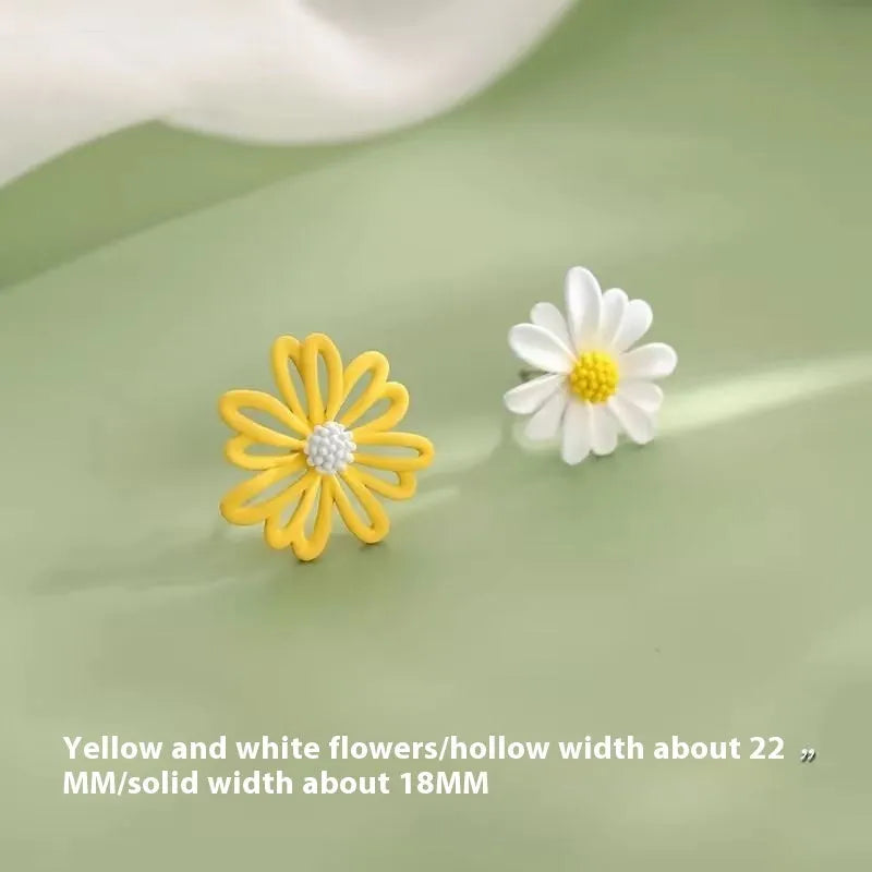 Cartoon flower earrings in alloy with blue and orange, white and green, or yellow and white two-tone colours