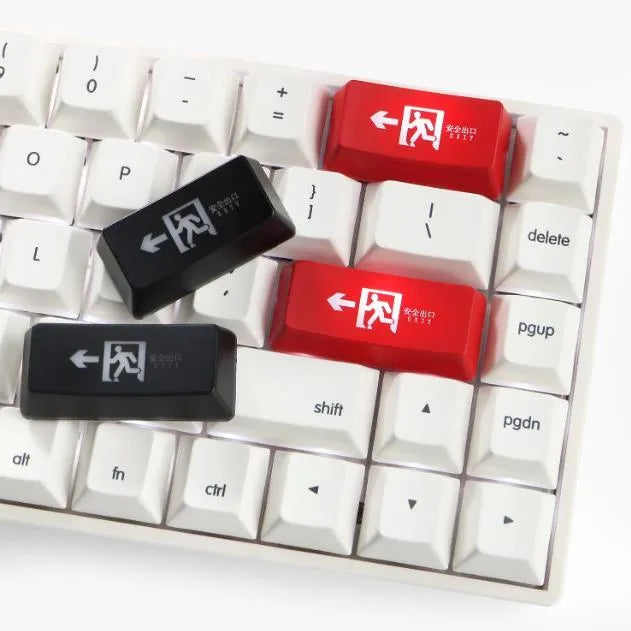 Transparent mechanical keyboard keycap with raised safety evacuation exit symbol for backspace replacement