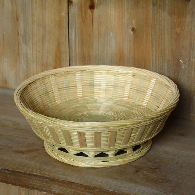 Handmade natural bamboo storage basket in traditional woven construction