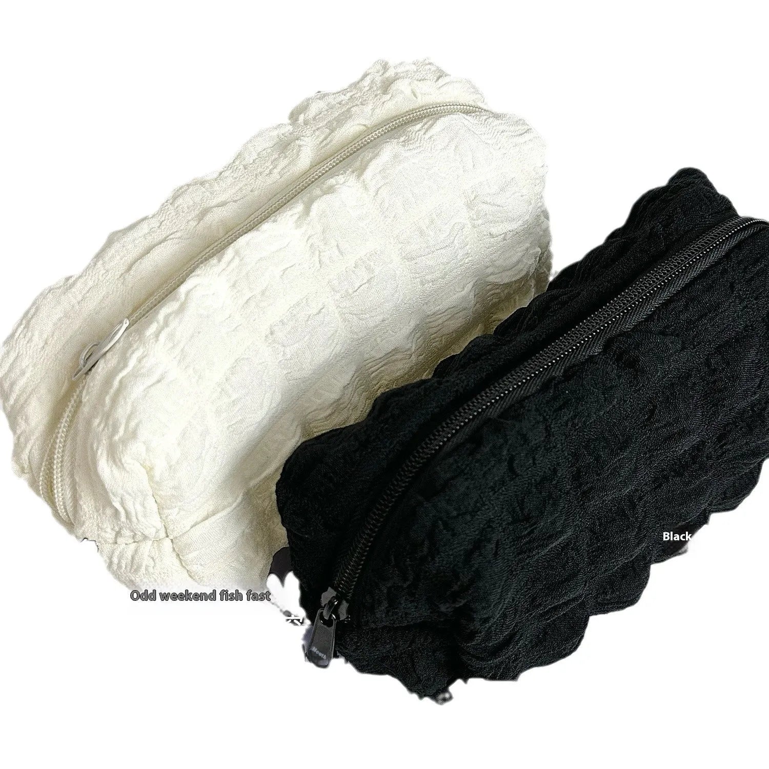 Cream puff style fabric pencil case in beige or black with zip closure