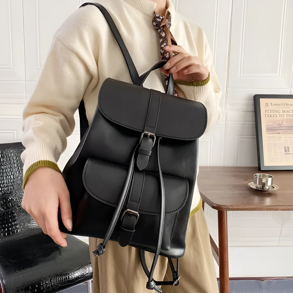 Retro college style small PU bucket bag in khaki with clamshell opening and multiple interior pockets