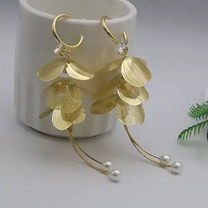 Floral petal pearl fringe earrings in gold with electroplated alloy and tassel drop design