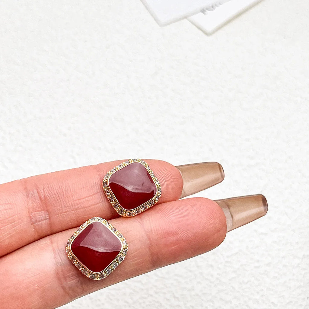 Red square geometric earrings with inlaid design on alloy base