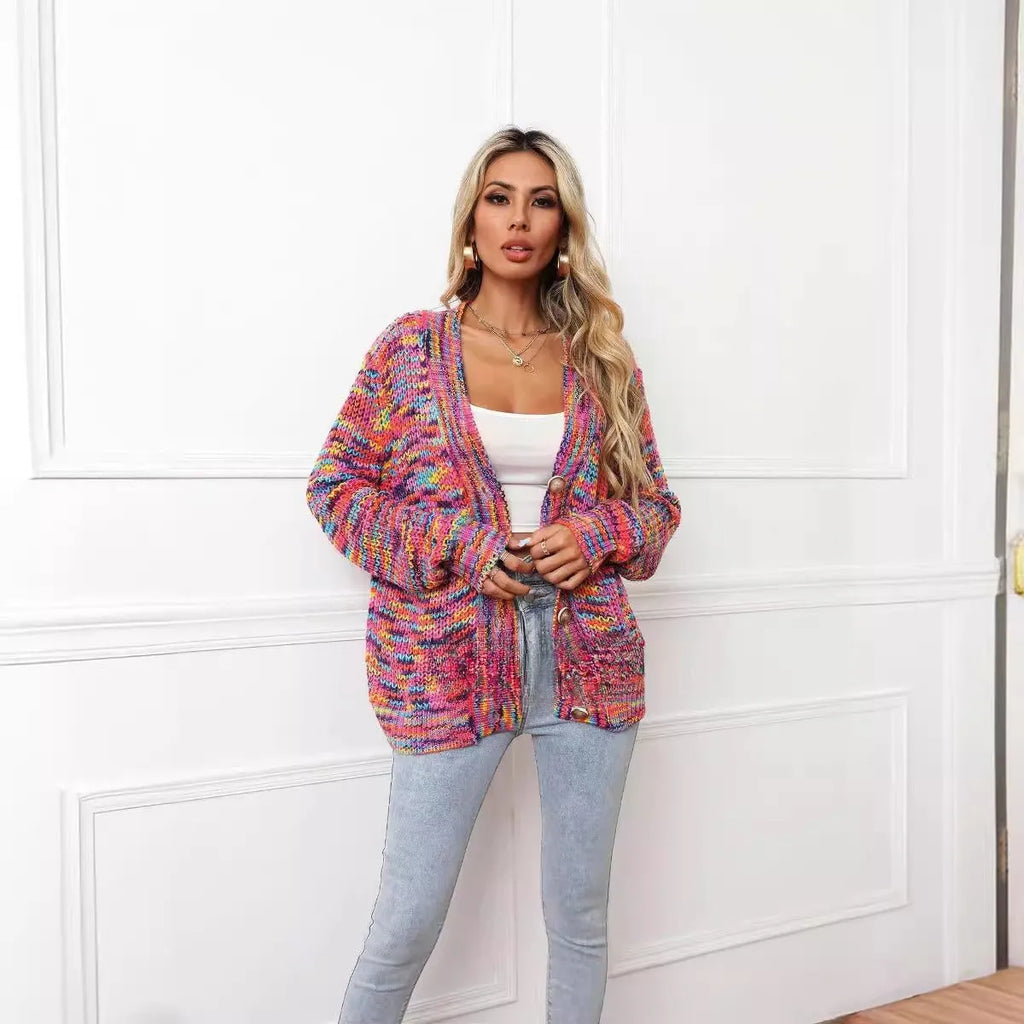 Rose Red rainbow striped loose-fit knitted cardigan coat on a hanger.