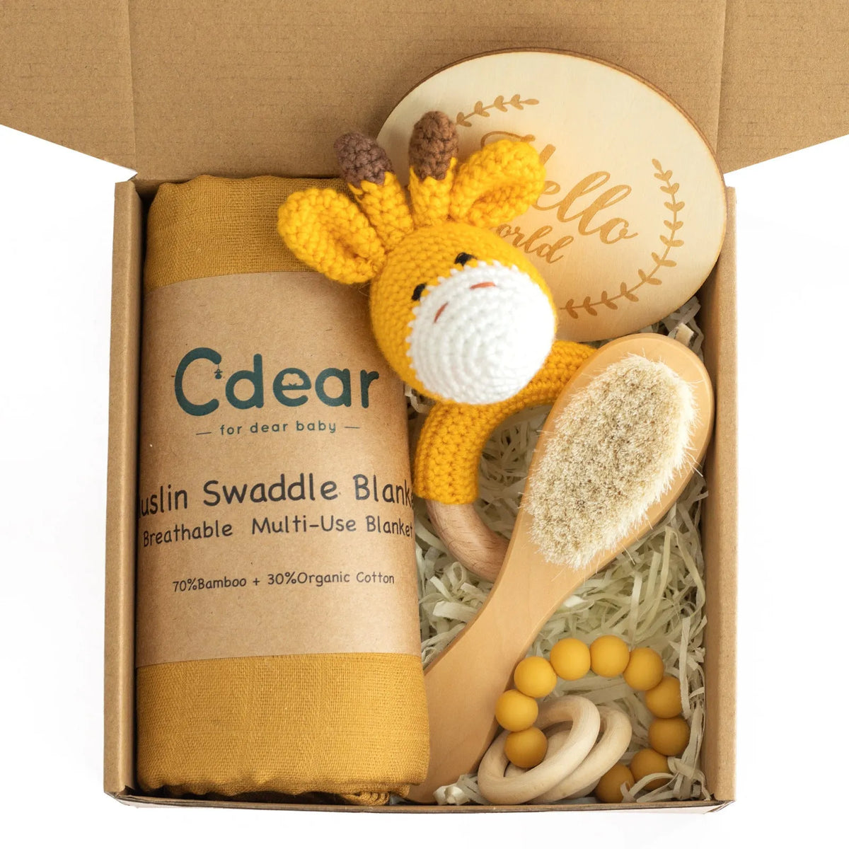 Baby teething toy gift set with bamboo blend gauze blanket, wooden beech bell, teether, brush, and milestone marker.