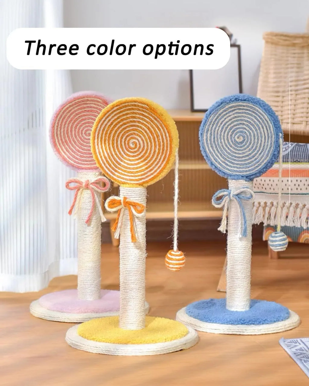 Blue cat scratching post with sisal rope and hanging ball on wooden base