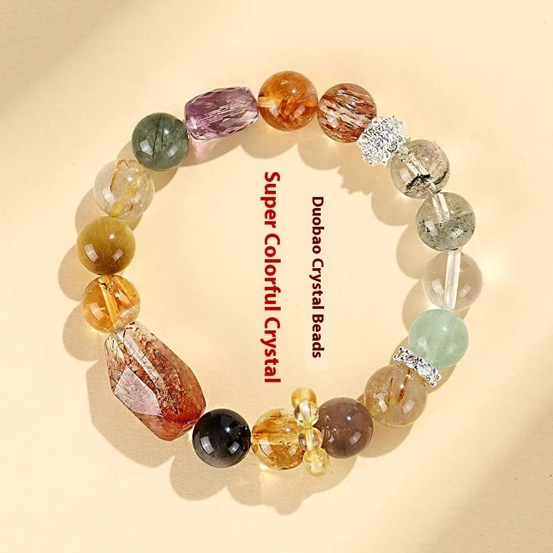 Women's natural crystal bracelet with black gold beads and adjustable slip knot closure.